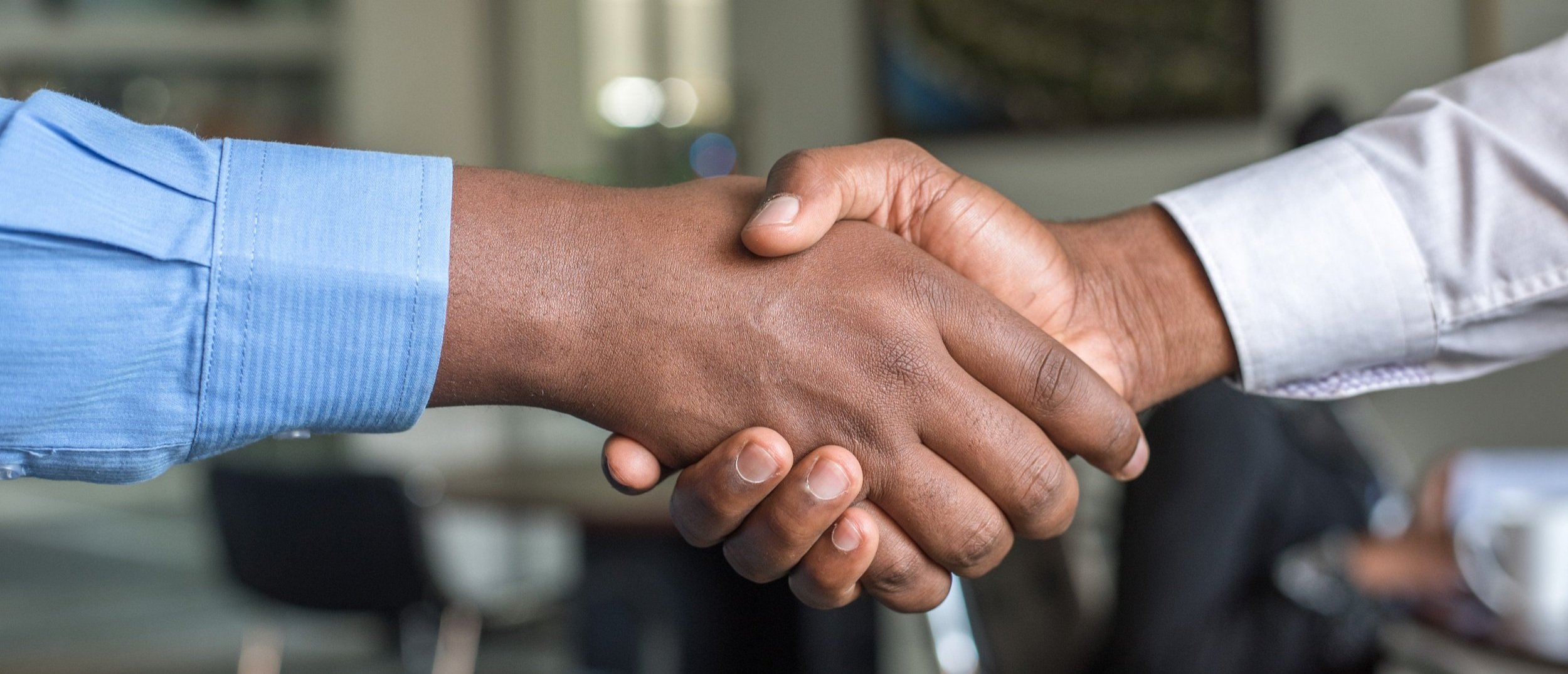 decorative image image of people handshaking